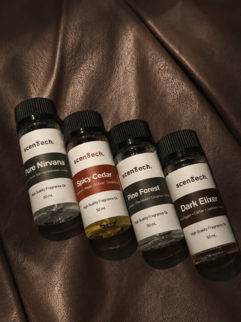 Four Scentech fragrance oils for an diffuser displayed in aesthetic UGC content
